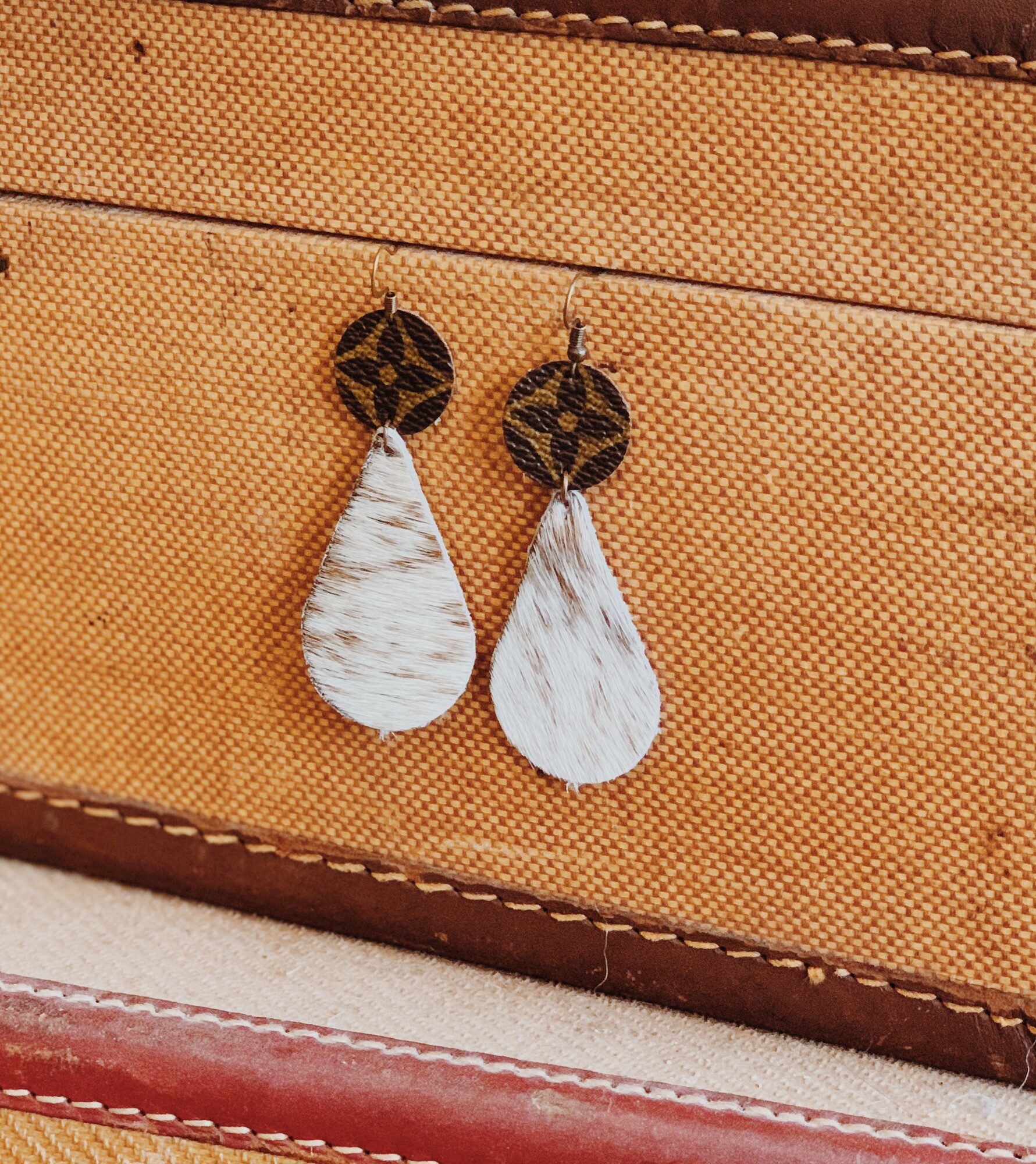 These gorgeous upcycled, handmade earrings were made from an authentic Louis Vuitton bag!

They measure about 3 inches long.

Resurrect Antiques is not affiliated with the LV company.
The bag's date code is SP0927