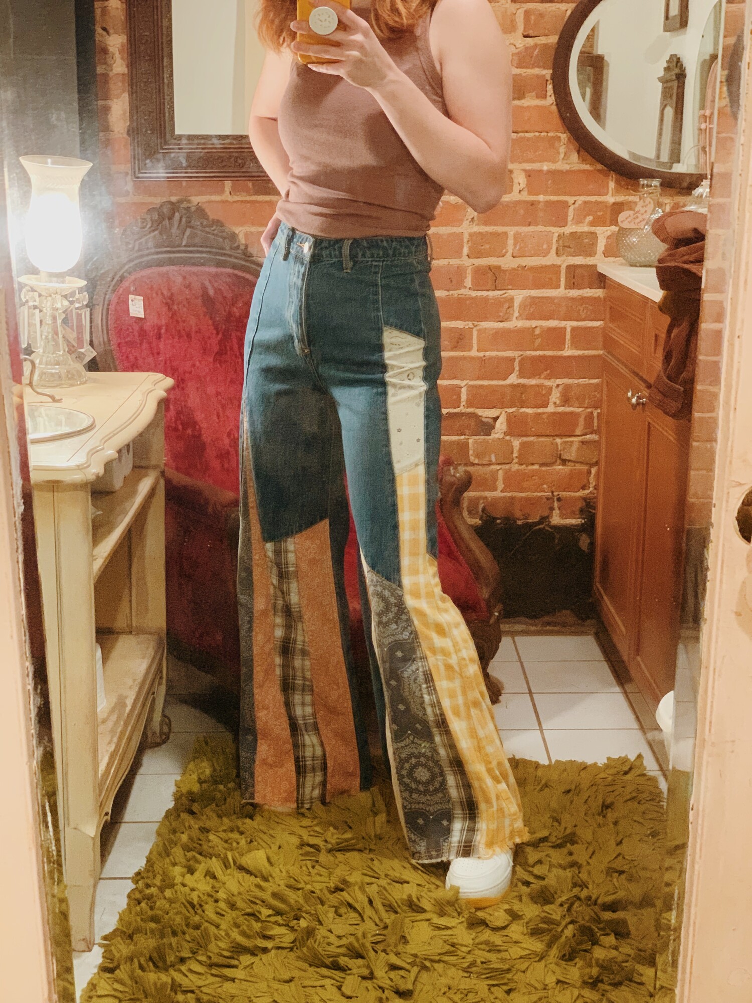 These patchwork jeans are absolutely fabulous! Worked into the denim is an assortment of plaid and paisley patterned fabrics!
Note: These jeans do run small. See measurements below.

Small Waist: 26 (Inches)
Medium Waist: 28 (Inches)
Large Waist: 30 (Inches)