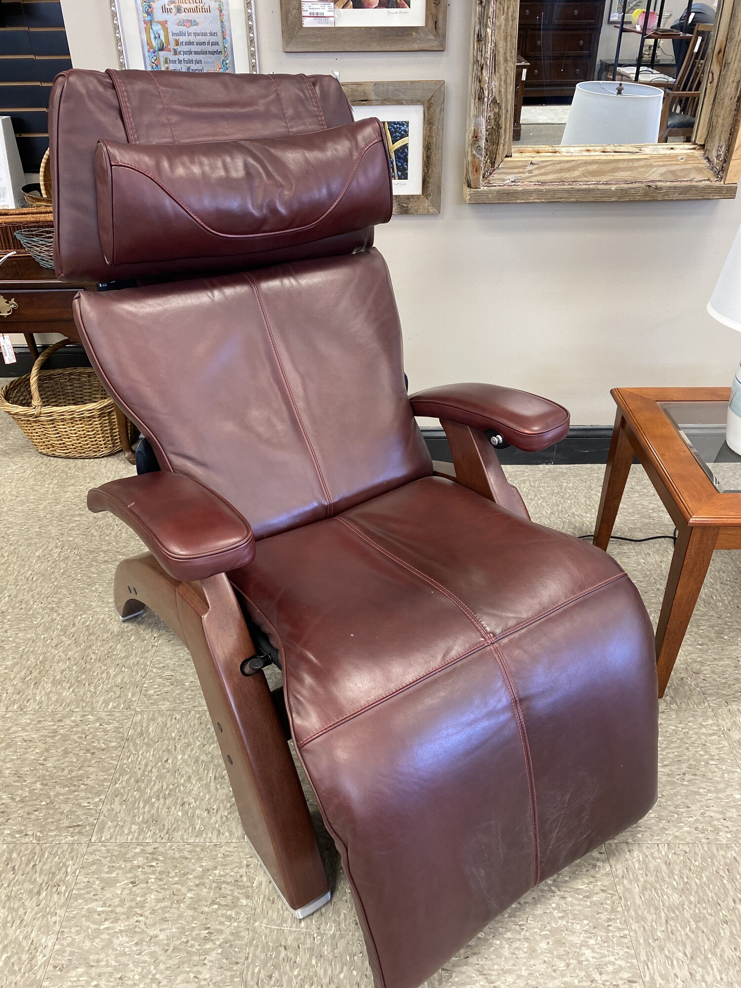 Human Touch Zero Gravity Recliner, Burgundy, Size: 60x30x42 inch
Omni-Motion Electric  Power Classic Perfect Zero Gravity Recliner / Chair - The Silhouette is a slightly smaller Perfect Chair with a slightly more compact footprint & features the same independent leg control for improved style & comfort. Now you can control the recline angle & leg elevation positions separately.
The 5-Way Controller gives you maximum control of your Perfect Chair experience.
New longer armrests support your arms even in the reclined position.
The zero gravity position cradles your back and elevates your legs above your heart, which is the position that doctors recommend as the healthiest way to sit.
Easy ingress and egress are achieved with the extended range of motion in the upright position.
Exclusive Features Patented Orthonomic body frame with built-in lumbar curve.
Extra wide legrest provides maximum comfort.
Hand carved & finished base is pleasing to the eye, and constructed for years of use. .
Brake control system is easy to use & extremely reliable.
Adjustable headrest feature allows you to customize the optimum angle of comfort to maximize neck support while reading or watching television.
Exclusive guide rail system for smooth recline motion & position control.
Add standard 9V Batteries for an Emergency Back-Up System.
Upright Dims 43L X 30W X 47H, Reclined Dims 63L X 30W
Reclined Headrest Height 26, Reclined Footrest Height 31, Seat Width 22
Gross weight (chair in box) 90 lbs, Maximum Load Weight 400 lbs
Required Recline Clearance is 9, Recline Angle 125-175 Degrees
Human Touch 5-Year Factory Warranty - 3 Years In-Home Parts and Labor with 5 Years Parts
Shipping Box Dimensions 42L X 30W X 27H