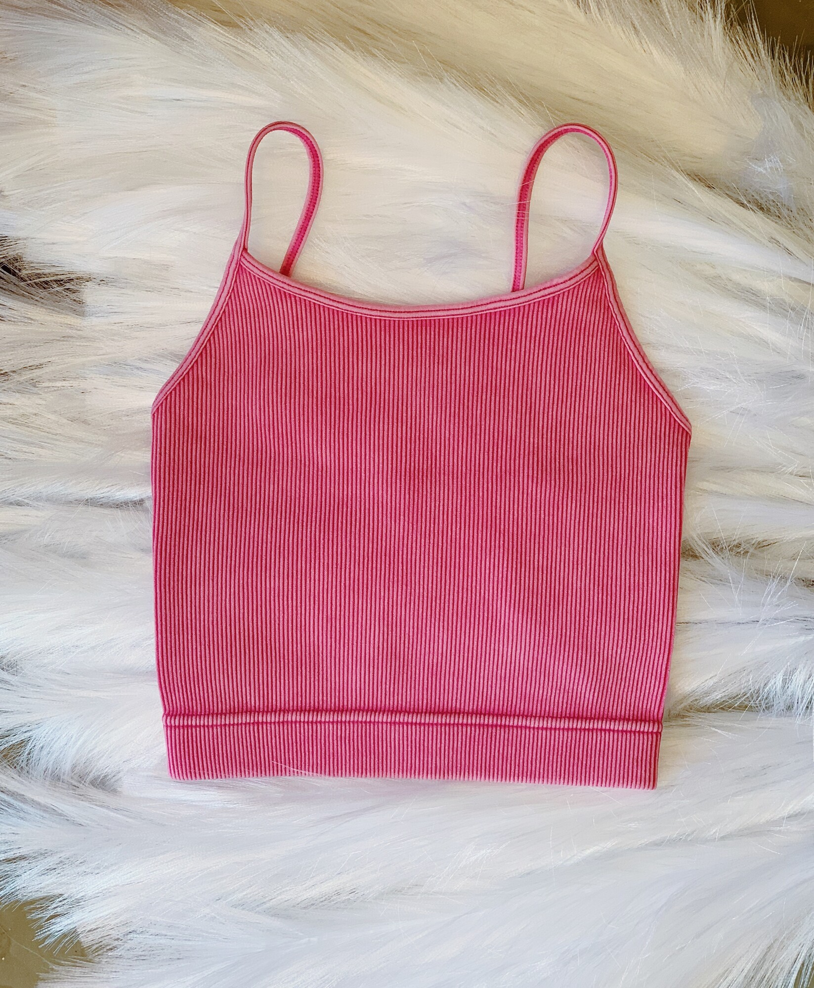These adorable, athletic bralettes are made of a stretchy, breathable fabric!