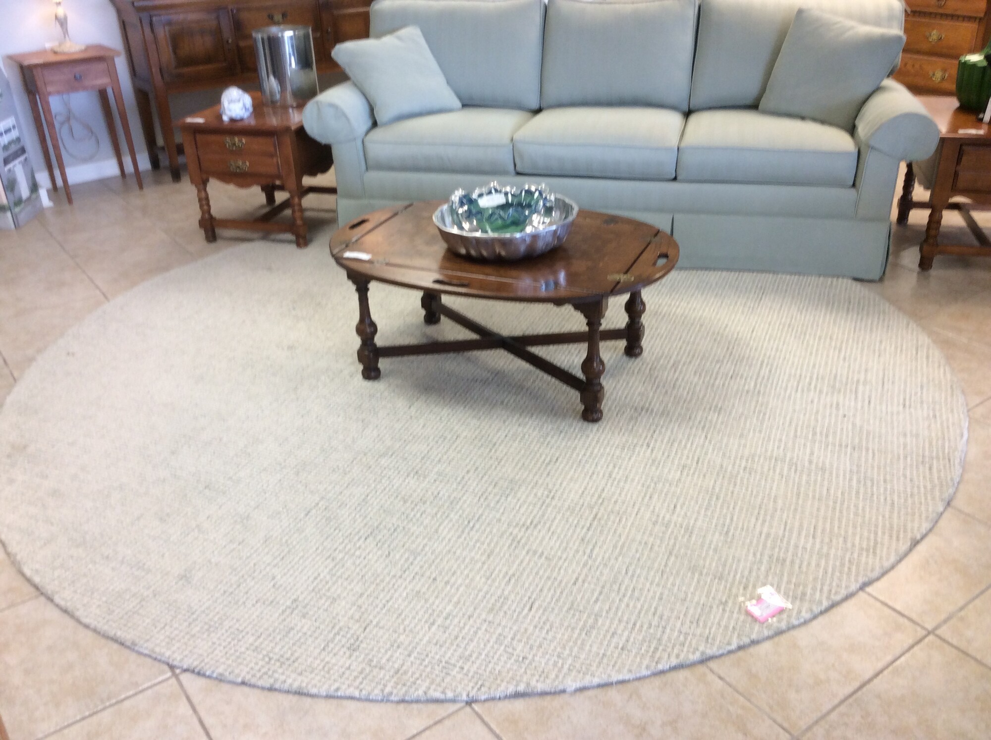 This is a beautiful Mint Green & Cream Round Woven Rug.