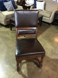 This chair is influenced by authentic, traditional designs that have been updated by Bernhardt  for the relaxed and more casual look of today. Clean, strong lines, and turned posts complement the beauty of the natural wood, which takes front and center with
plantation grown mahogany veneers. Part of their Vintage Patina line. Presented in a mid-tone Tobacco and deeper Molasses finish

Matches #144973

Dimensions 22x22x42