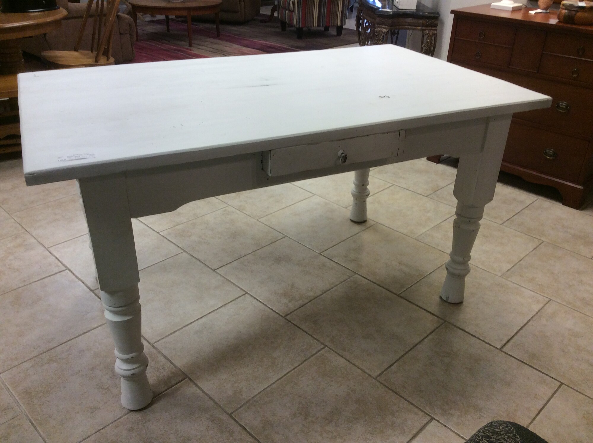 This is a beautiful, hand painted distressed white desk. This desk has one center drawer for office supplies.