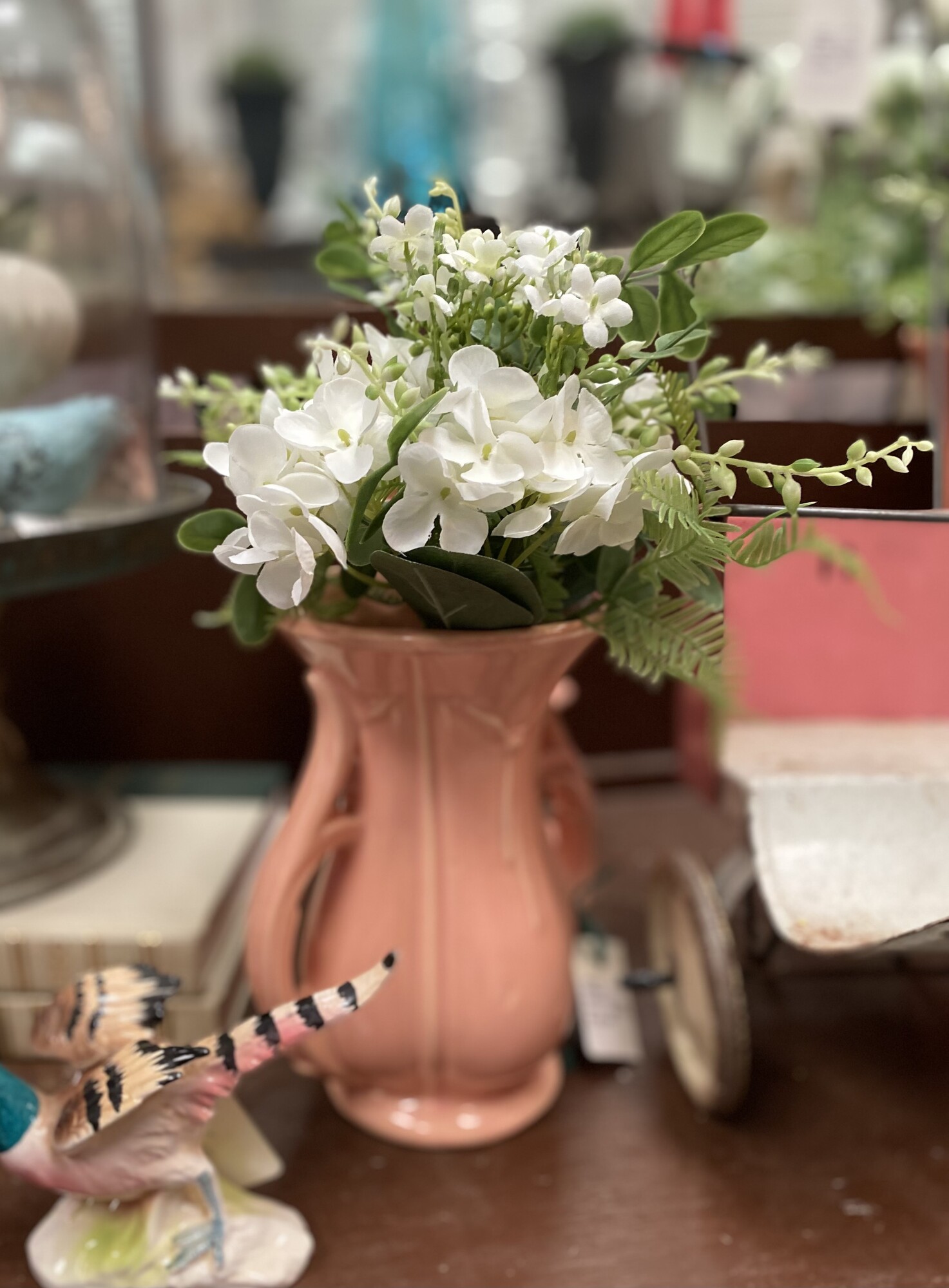 This gorgeous hydrangea bouquet is the perfect mixture of flowers and greenery.  The five stems are tied together with raffia so you can easily seperate it or leave it tied together and just pop in a vase or simply lay it just about anywhere