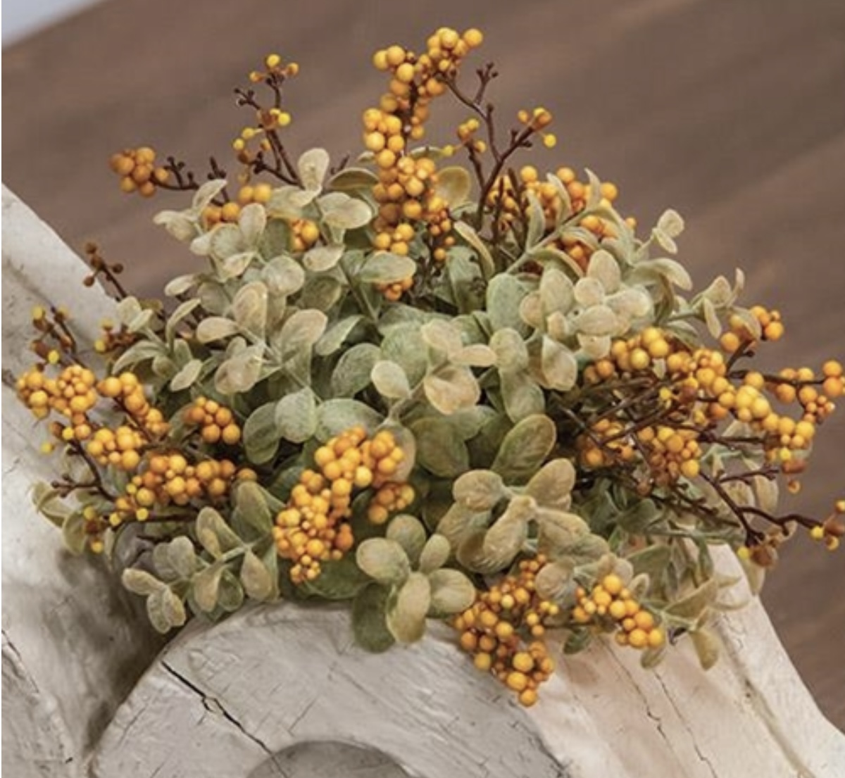Lend any space a touch of refinement with the Pebble Creek Half Sphere on a flat base. This sphere boosts foam berries in a deep yellow shade perfect for curating autumn looks or for year-round display.  It looks darling in a decorative bowl or atop a shelf and would make a charming centerpiece
Measures 10 inches diameter and about 4 inches high