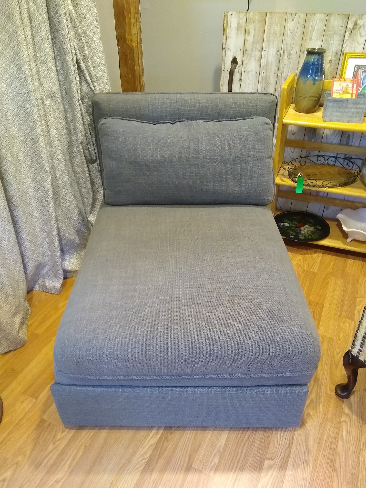 IKEA Blue/Grey ChaiseBed

Like new IKEA chaise which opens to a bed.  Fabric is a blue grey color and is excellent condition. The bottom of the chaise slides out and the cushion upzips to lay flat as a mattreess.  The back is adjustable and can be moved to fit any of the 3 sides of the chair.  Very nice piece!

Closed Size: 44 in deep X 32 in wide X 33 in high at back of chair.
Open Size: 83 in deep X 32 in wide X 33 in high at back of chair