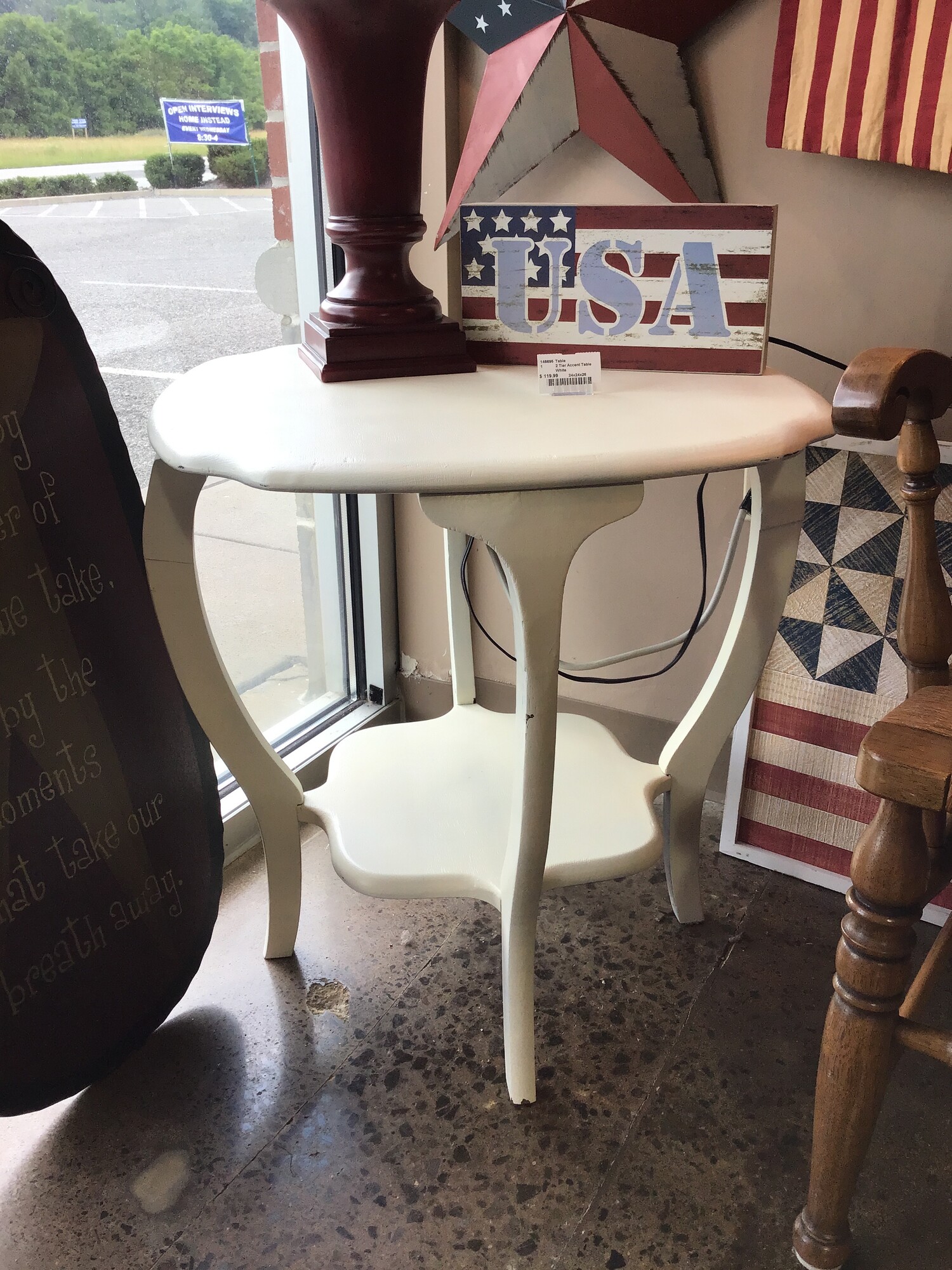 This vintage accent table was painted white. It features scalloped edges and a lower shelf.
Dimensions are 24 in x 24 in x 26 in