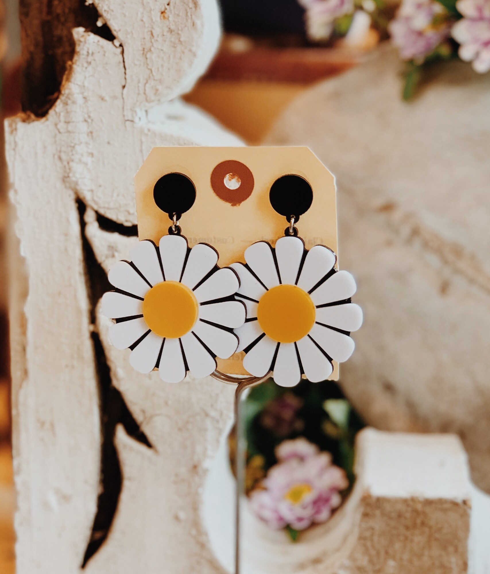 These happy earrings measure 2.5 inches in length. Adding daisies to any outfit will instantly make your day!