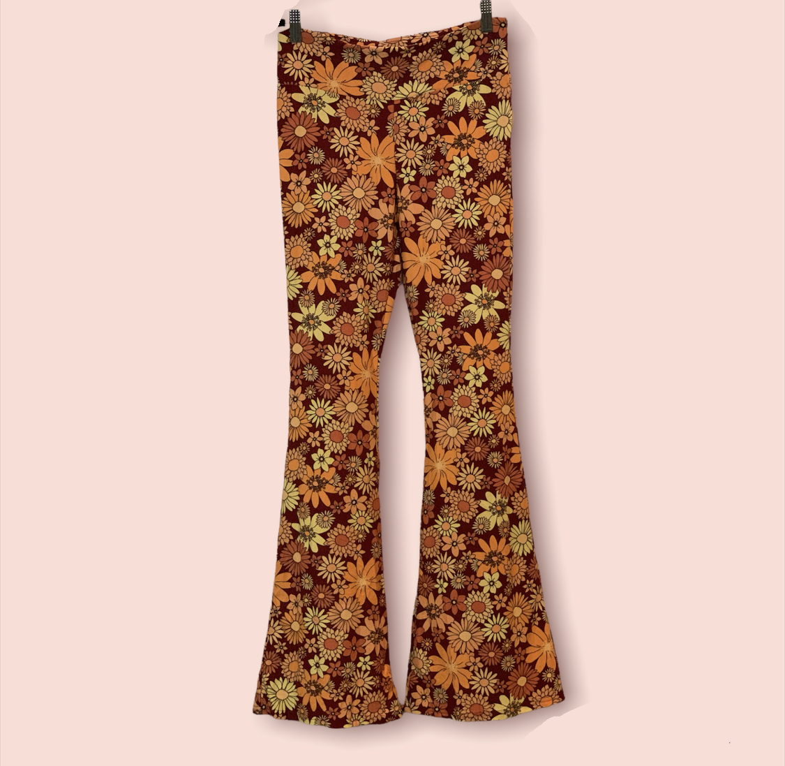 These groovy and fun bell bottom pants are made of a stretchy fabric with lots of give! These pants are so fun and perfect for anyone who loves color!
