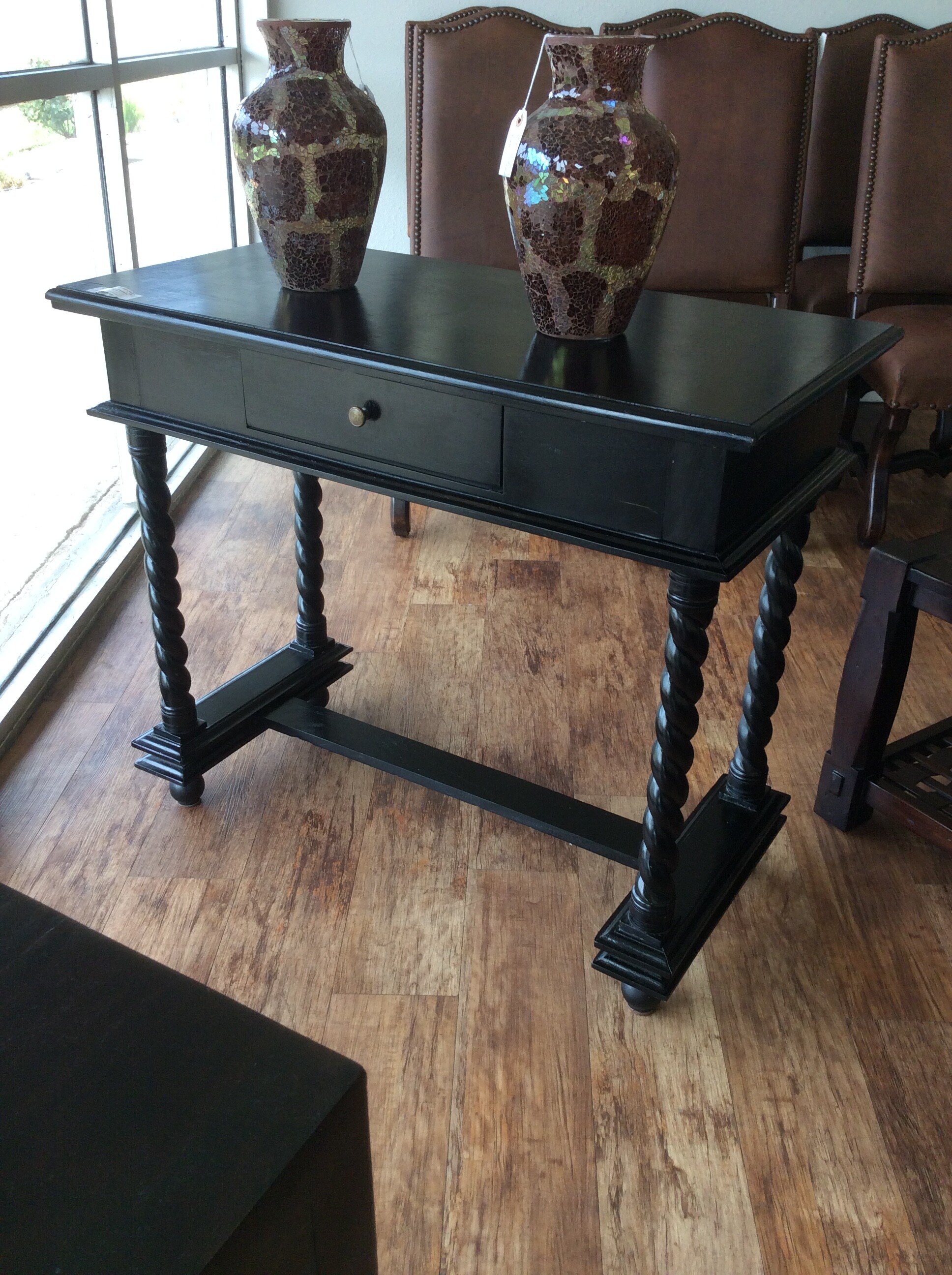 This is a beautiful black, Barley Twist Table with 1 drawer.