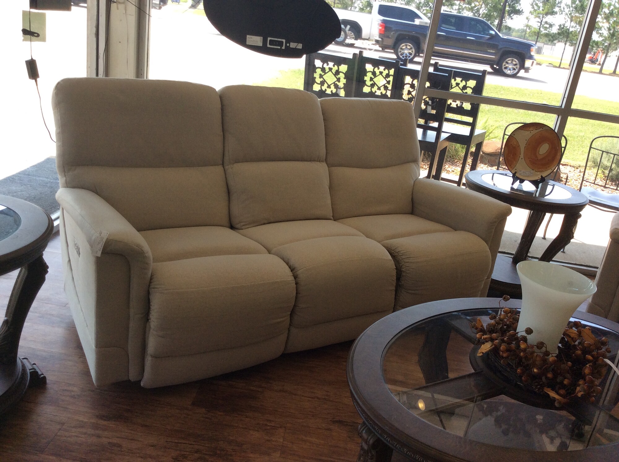 This is a 3 seater,cream, reclining Lazy Boy Sofa.