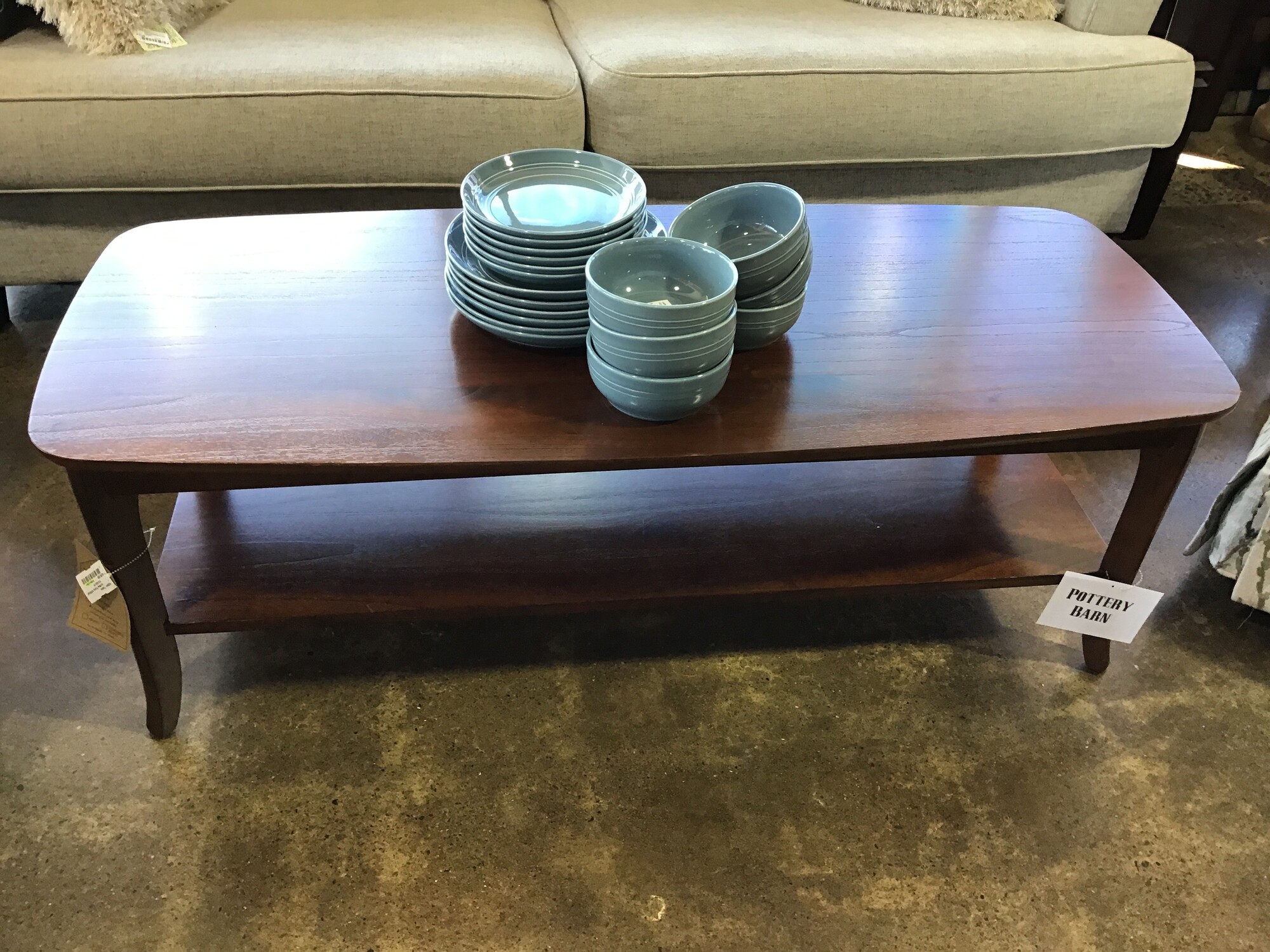 Pottery Barn
Coffee Table w/ lower shelf
Brown Wood

Dimensions:  52x22x18