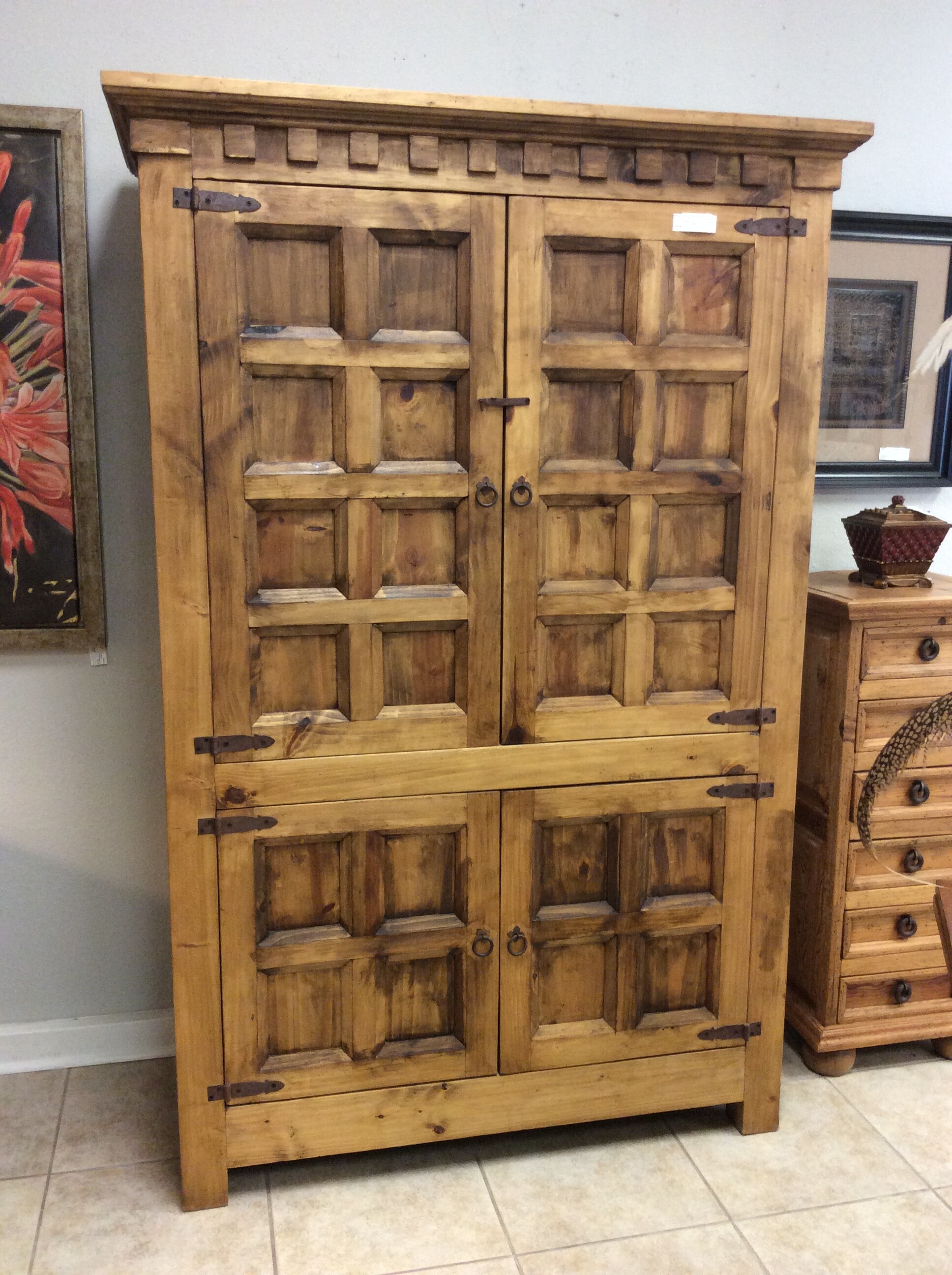 This is a beautiful, rustic armior with 2 cabinets that include shelfs.