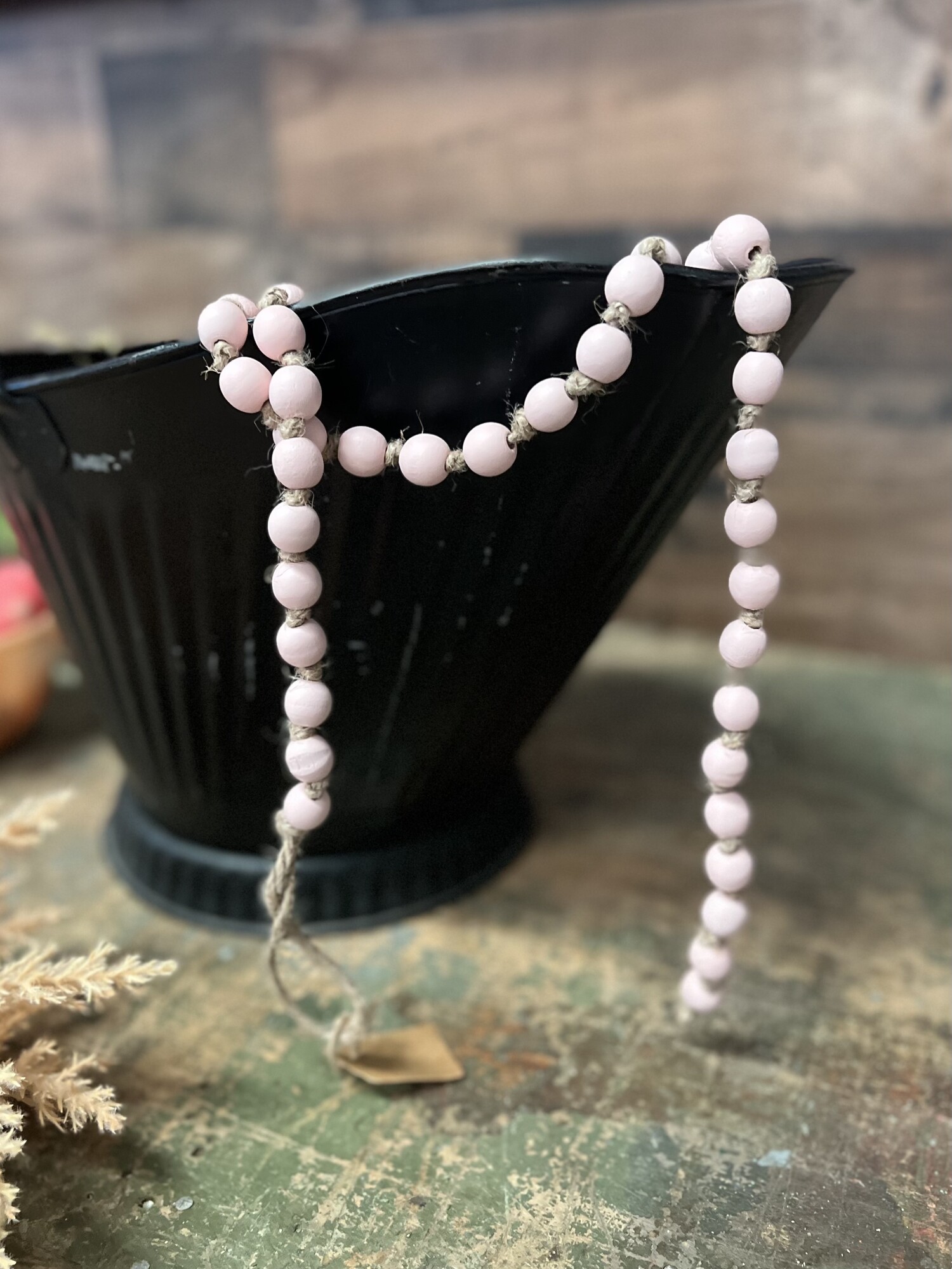 These beautiful soft pink wood beads are the perfect accent to any decor. Strand measures 38 inches in length