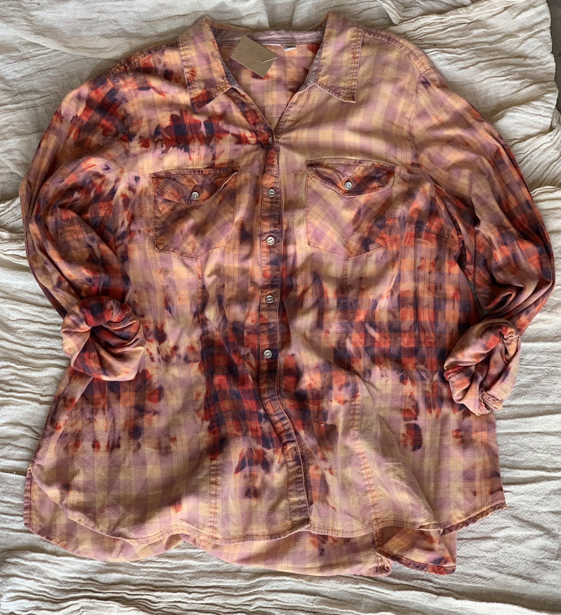 This gorgeous shirt by Kelli Hawk Designs is a loose fitting medium!