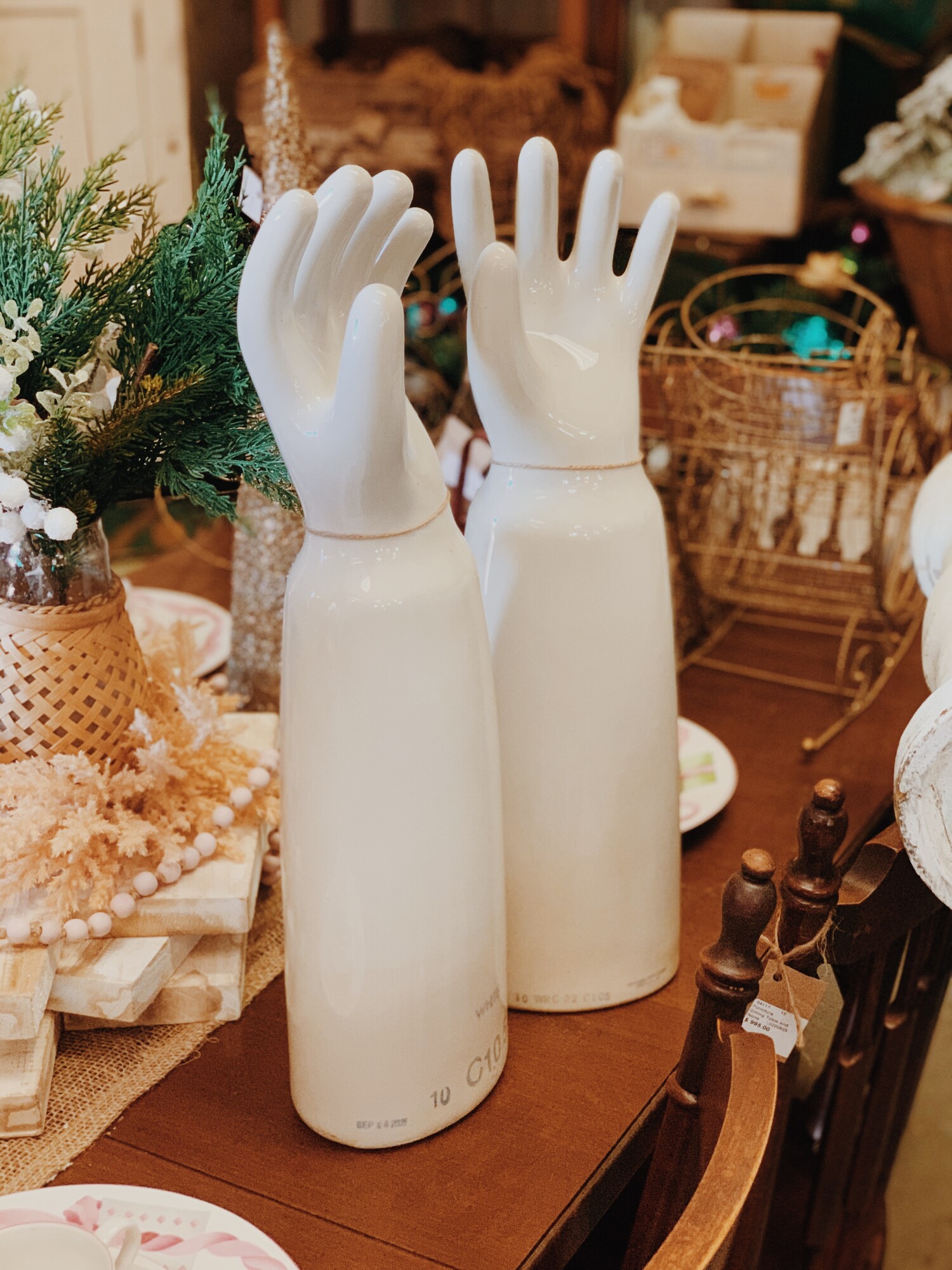 These vintage oversized white porcelain hand glove molds are the absolute coolest! These are great decor on a shelf or table in threes or fives paired with our smaller glove molds (19145). No two hands are exactly alike, but they measure roughly 22.5 inches tall by 7 inches wide.