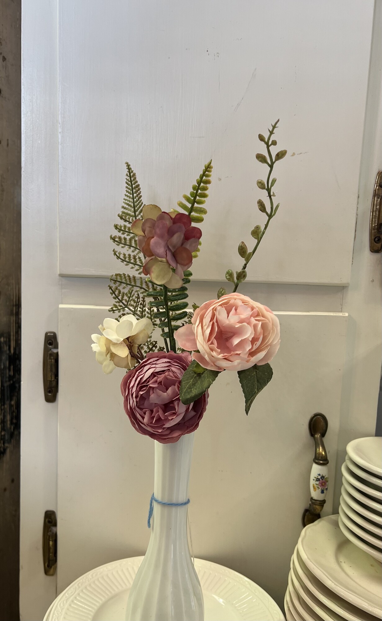 Add a touch of spring to your home with this Peony Spray.  This pretty floral has peonies, small hydrangeas and a few sprigs of ferns. Just drop it any stem vase for a perfect touch
Spray measures 16 inches in height