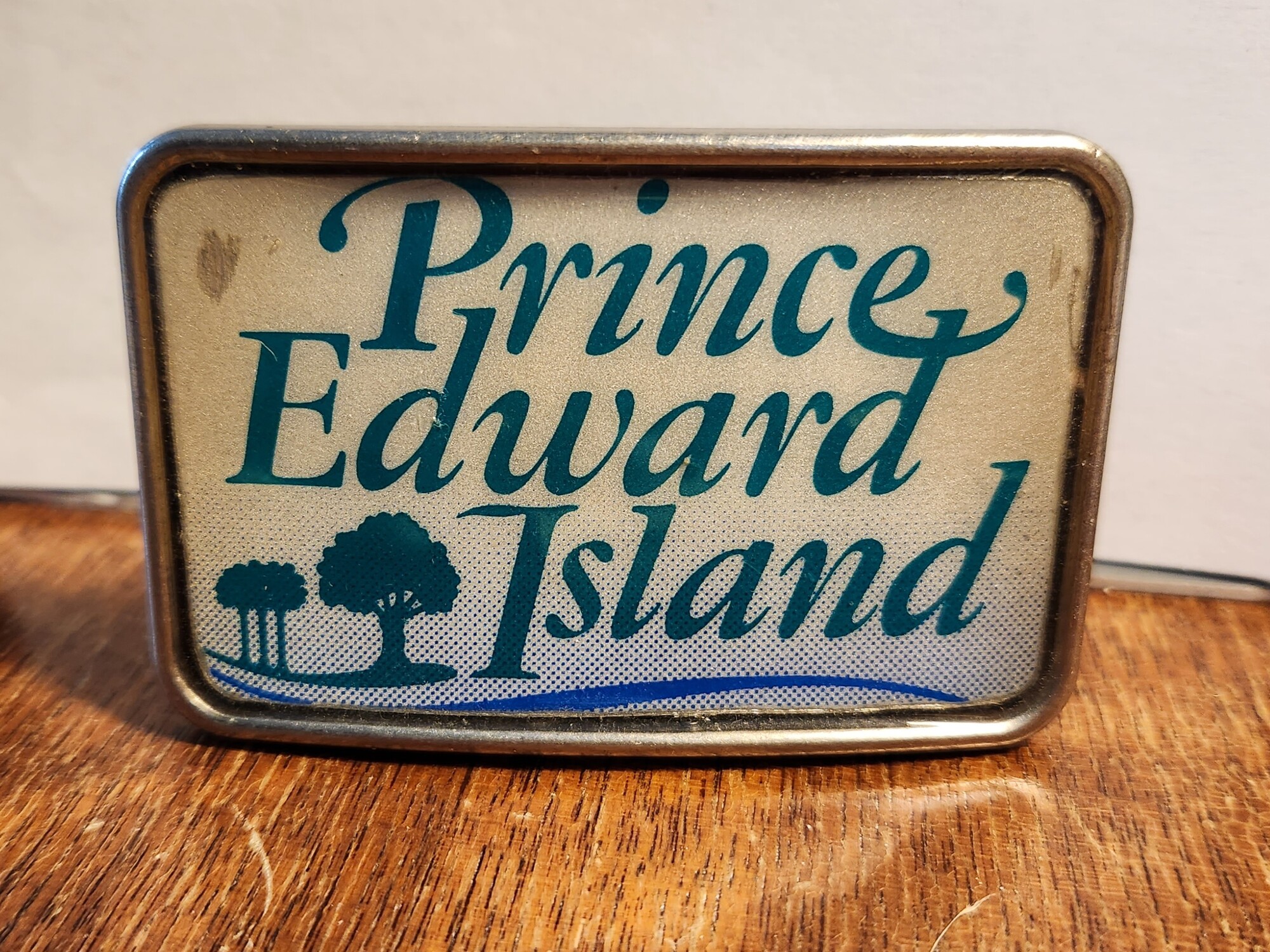 Vintage License Plates have been used to make resin filled belt buckles.
Made by a local friend 10 years ago.  These have not been used and have been stored.  They are approx. 3 x 2 and roughly 1/4 thick.
The belt opening is for a 1.5 wide belt.   They are  a one of a kind find
PLATE FROM PRICE EDWARD ISLAND