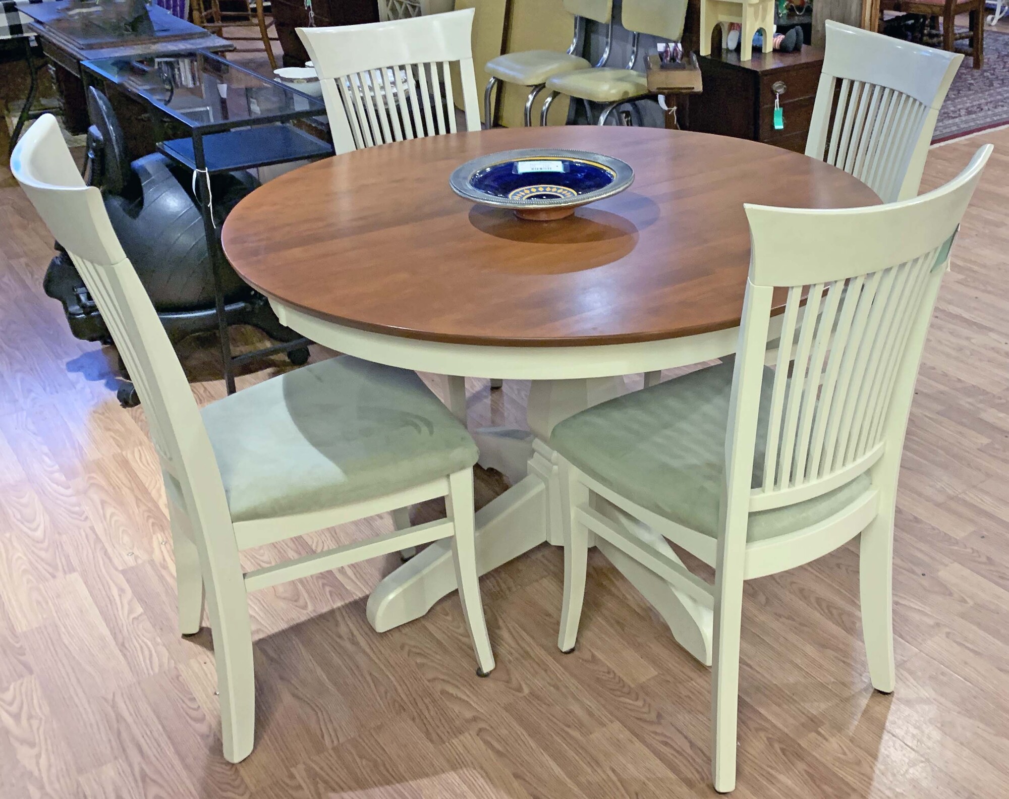 Cream and Brown Dining Table and Four Chairs - $290.
48 Round x 30 Tall with a 20 In Leaf.