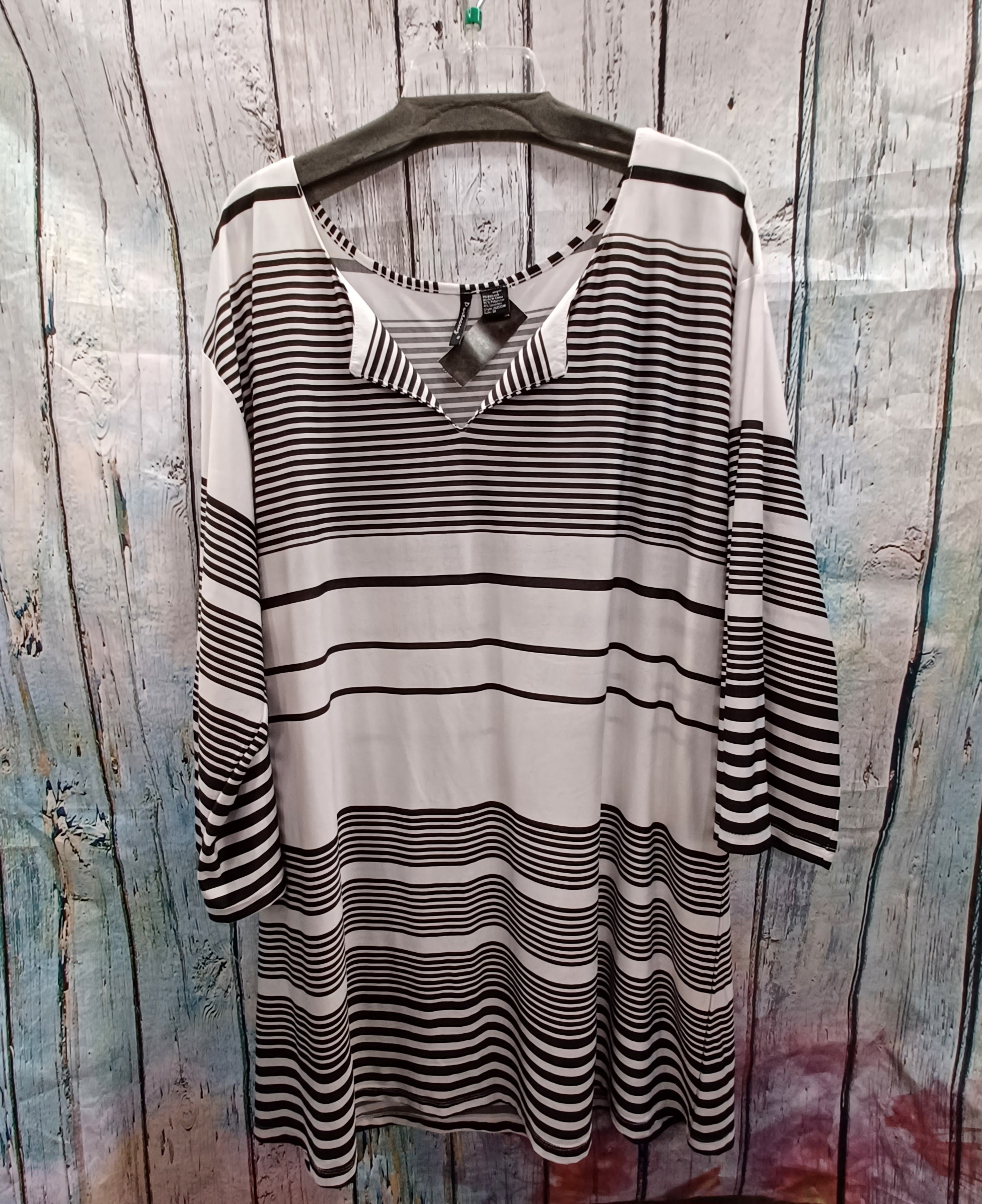 Love this black and white striped tunic blouse that is perfect for the office