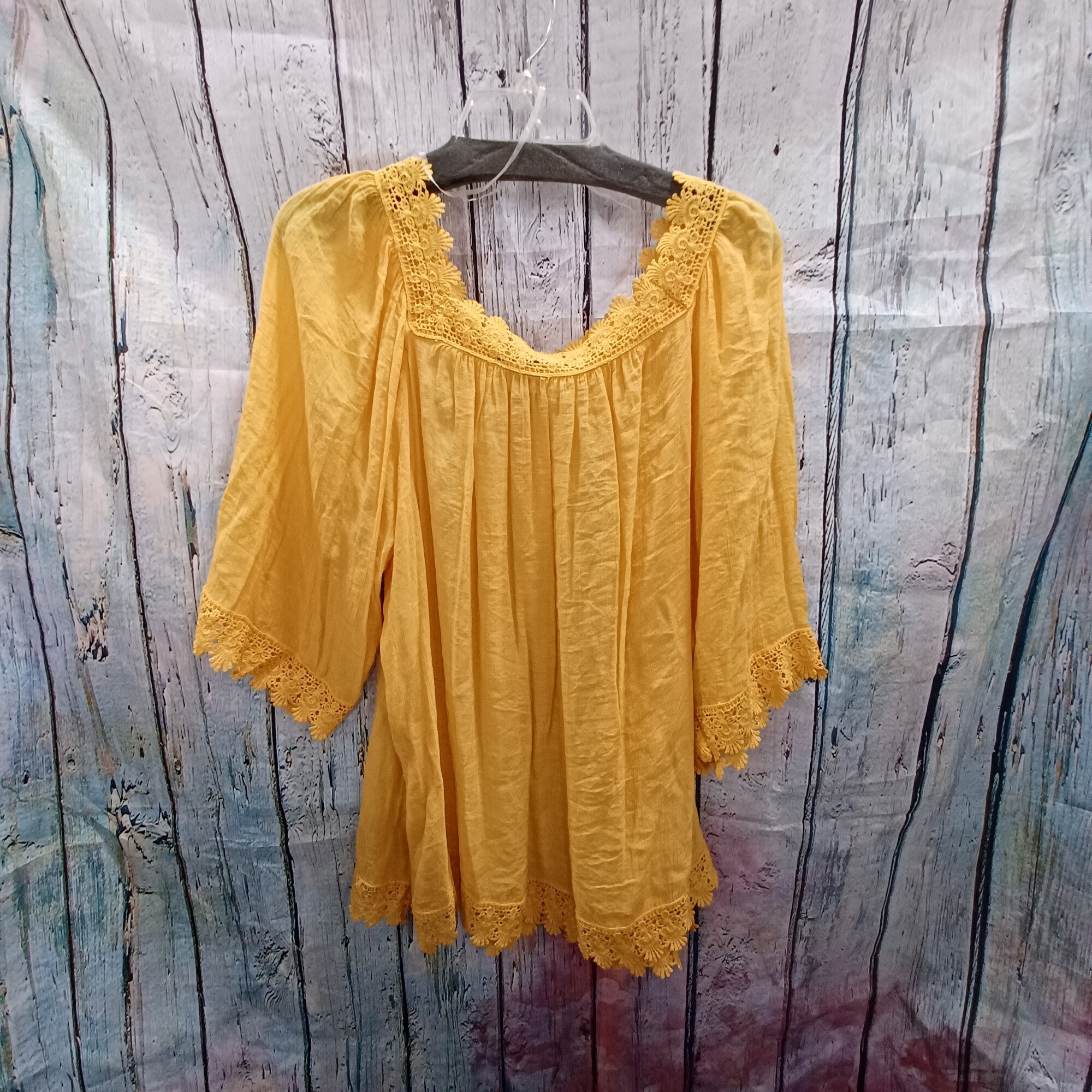 Super cute flowey blouse in goldenrod yellow with adorable lacing on the neckline, sleeve cuffs and waist