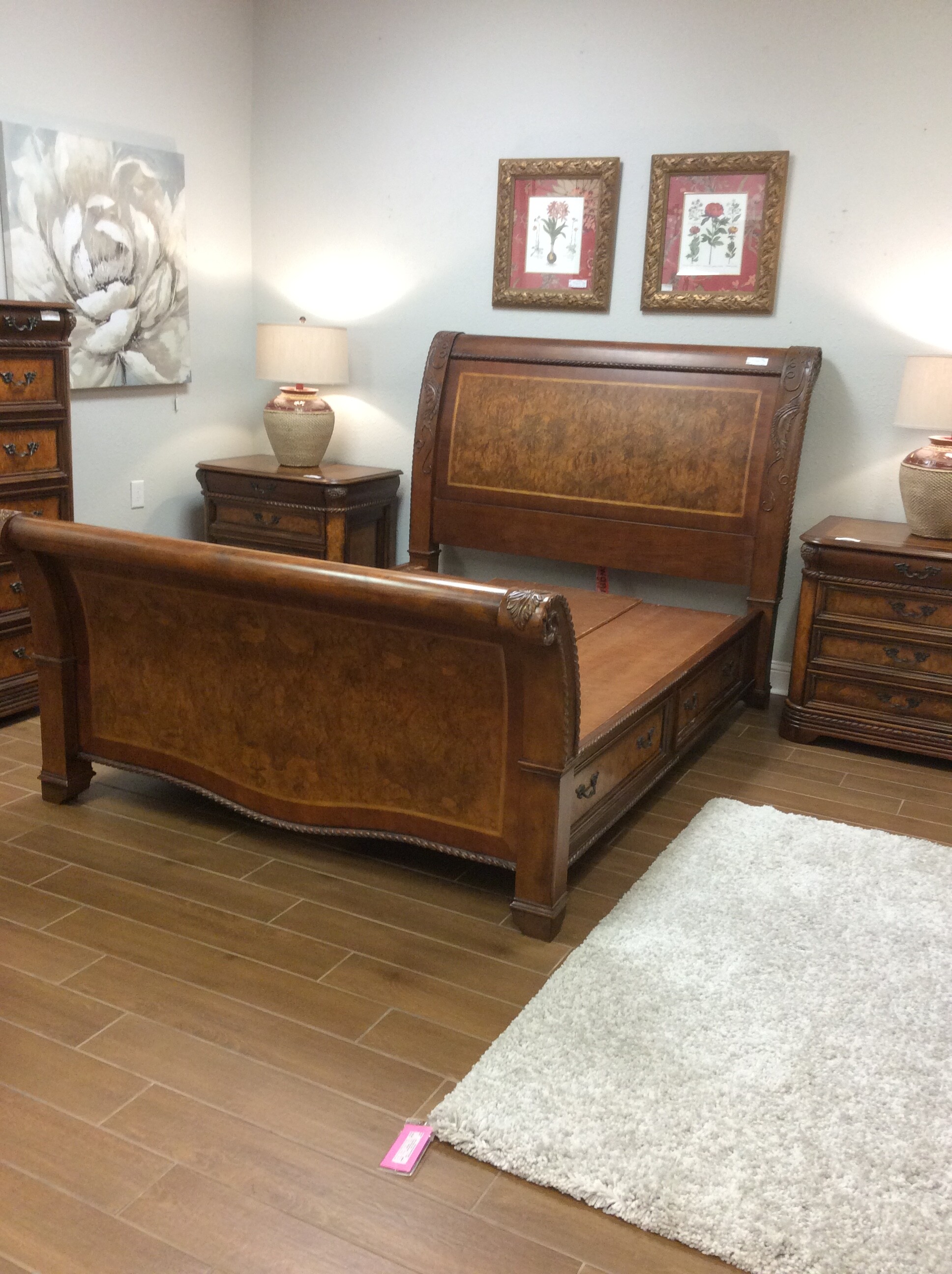 This is a beautiful 4-piece bedroom set from Aspenhome. The set includes a headboard, footboard, a pair of nightstands and a dresser with a mirror.