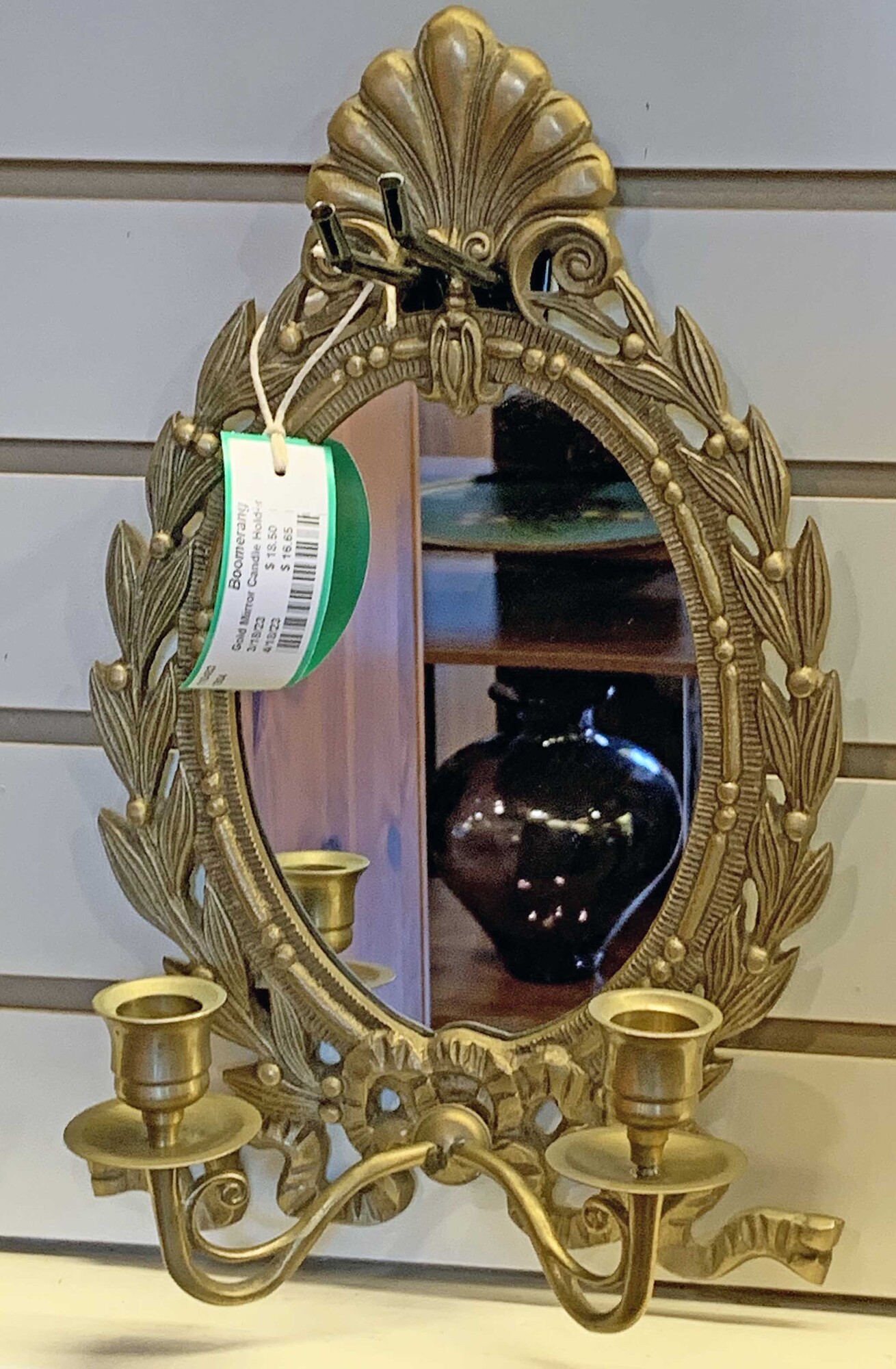 Gold Mirror Candle Holder

Size: 8w x 14h x 3.5d