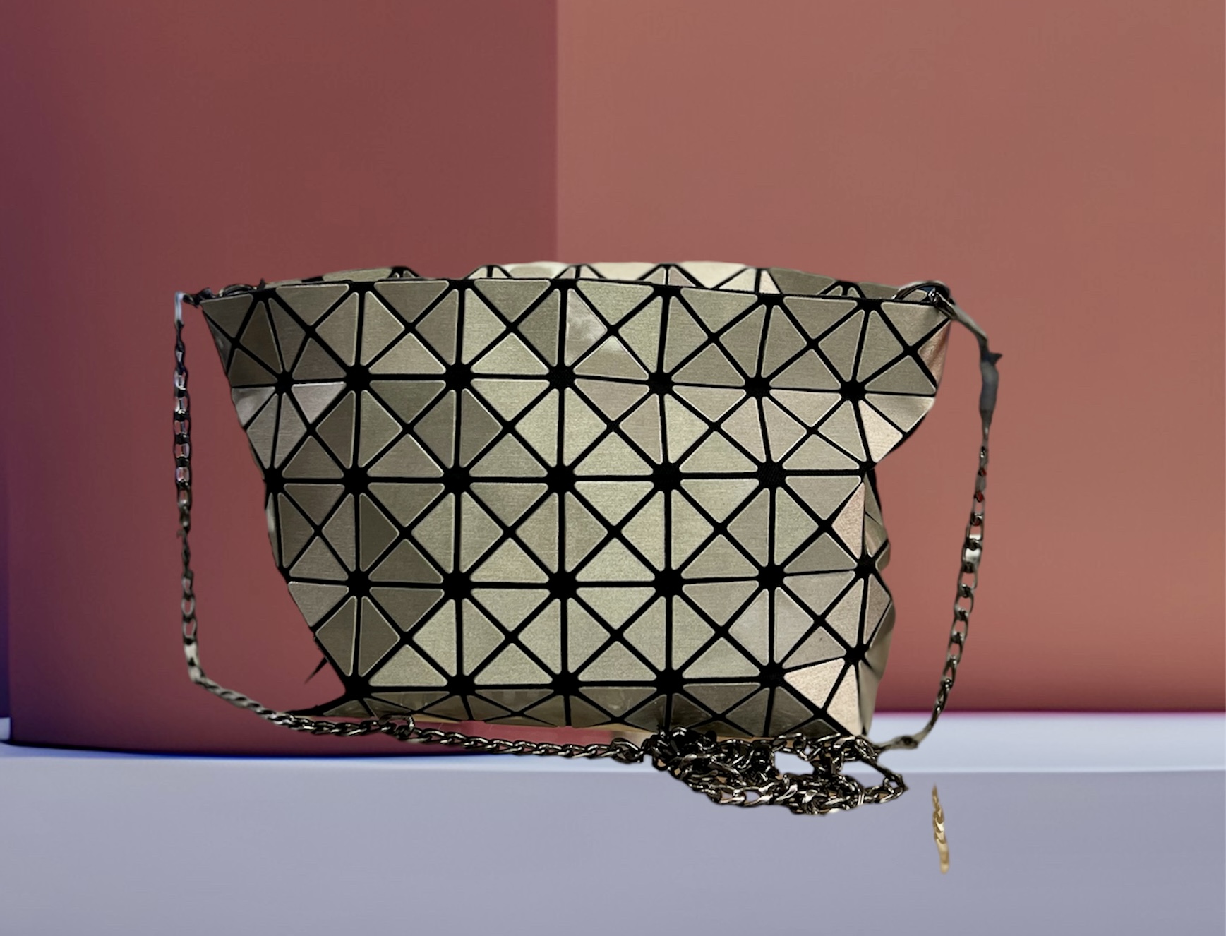 BAO BAO ISSEY MIYAKE
PLATINUM COFFRET CROSSBODY BAG
Featuring a textured, mirror-like surface, PLATINUM COFFRET has a soft, shimmering luster and matching metal chain.
This crossbody bag has zippered opening.
Material: Surface : Polyurethane / Base : 100% Polyester / Part : Synthetic Leather / Polyvinyl Chloride / Chain : Iron
Care: Wipe gently with a damp, tightly wrung soft cloth, and then wipe dry.
Dimensions: 5.9 x 9.1 x 1.2 in.
Original Retail:565.00
This bag is in excellent condition.