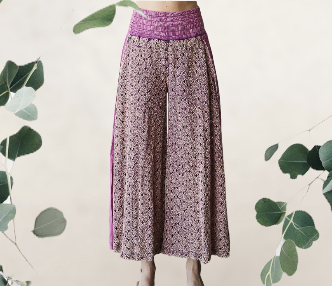These whimsical wide legged pants are as comfortable as they are stunning! The waistband has plenty of stretch, and the fabric is soft!