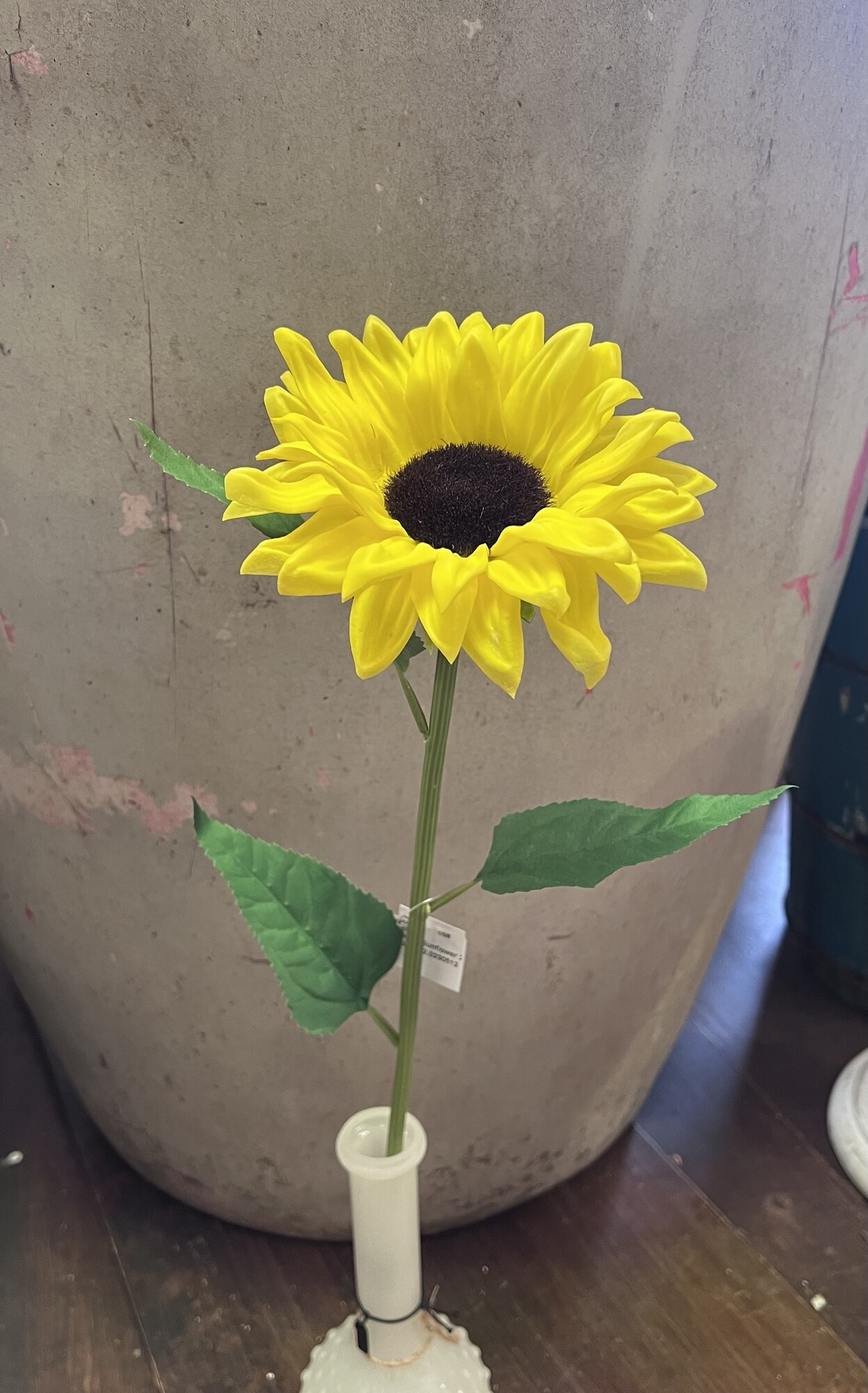 The foamy sunflower stem has foam petals on a flexible plastic stem. It has pretty yellow hues and looks great on its own or paired with similar florals. This stem can brighten any room and measures 20 inches high with a 5.5 inch diameter