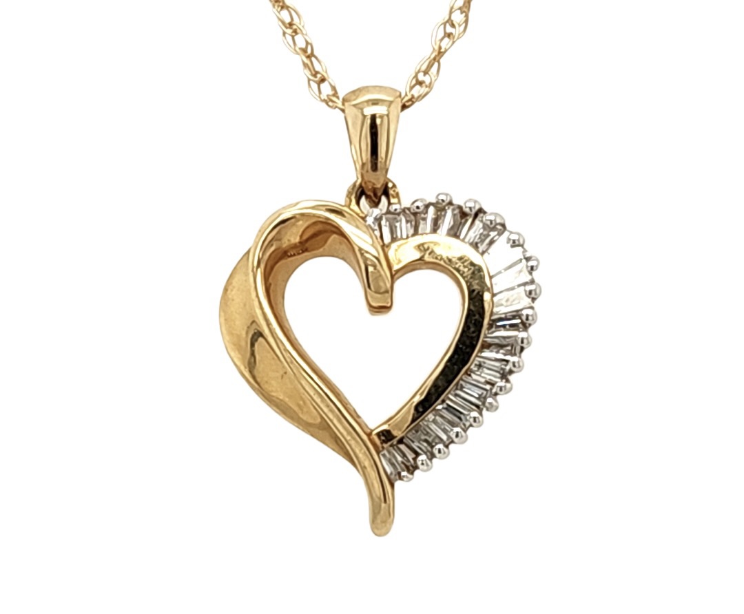 Baguette Diamond Heart Pendant
*New 18\" Rope Pendant Chain
14 Karat Yellow Gold
$760