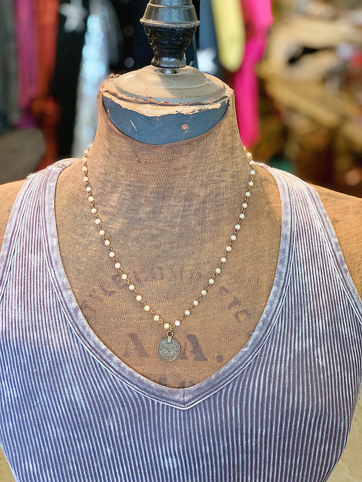 This beautiful necklace is on a 18 inch beaded chain with a 2 inch extender chain!
