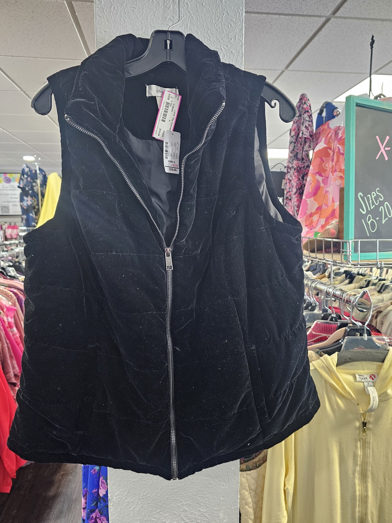 Brand new with tags and retails for $60. This is a classy sided puffer vest in a velvety zip up front.