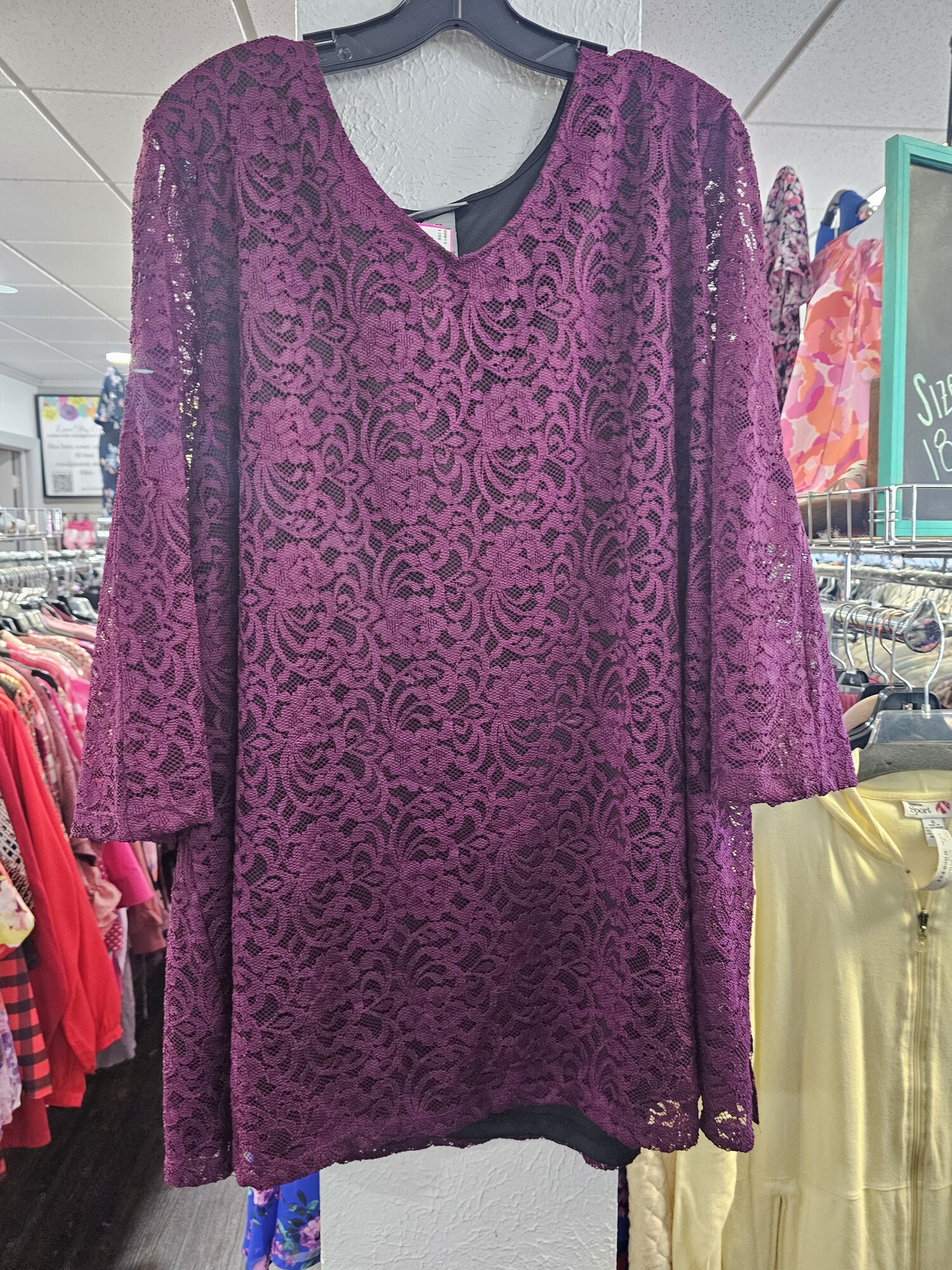 Brand new with tags and retails for $60. This burgandy wine colored blouse is allll the lace you could want with a black underlay for coverage.