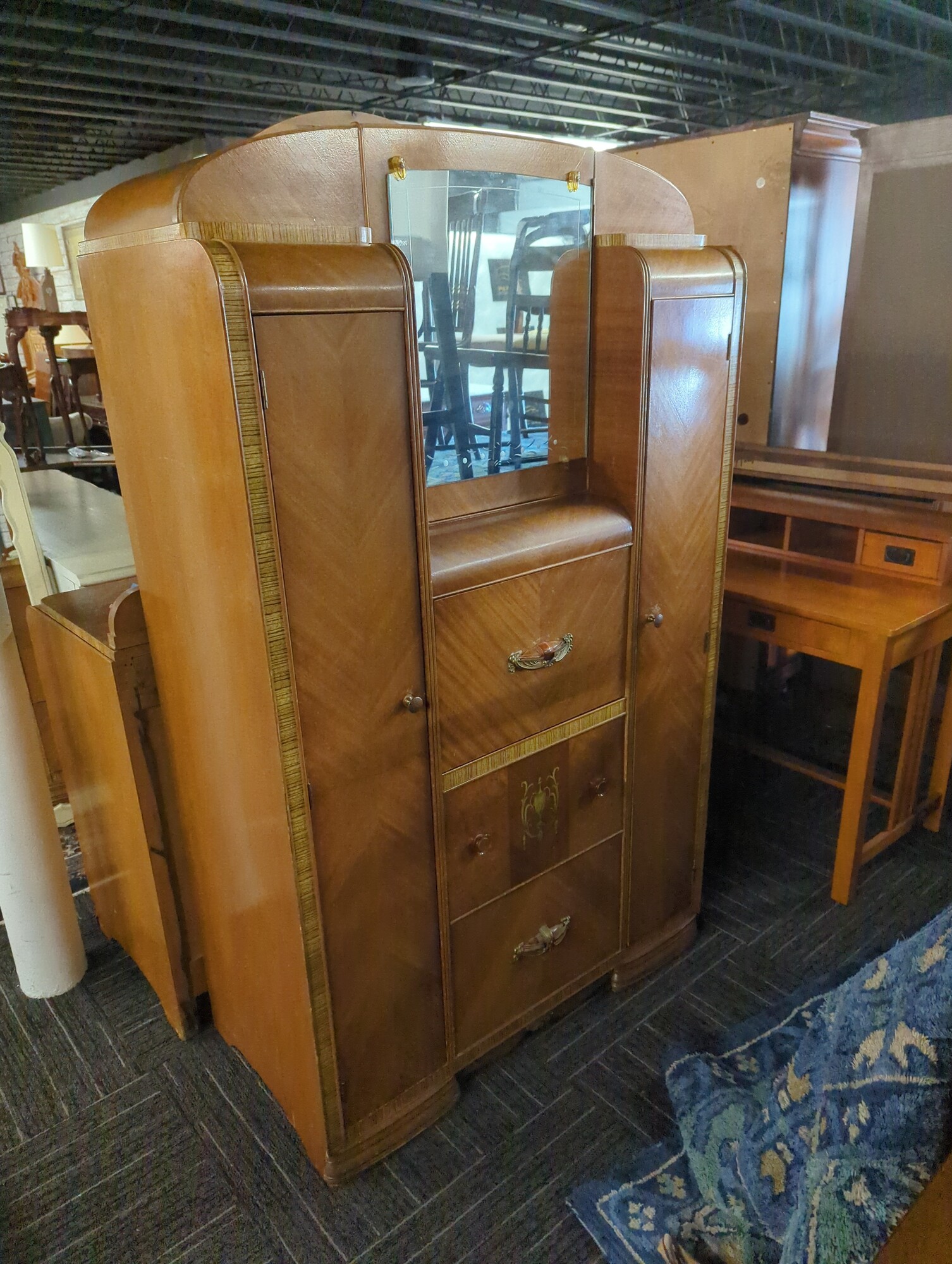 Waterfall armoire. 40in wide 20in deep 68in high.