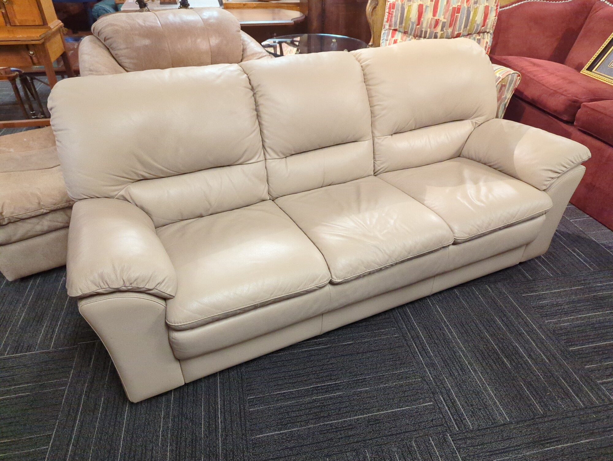 Leather sofa. 77in wide.