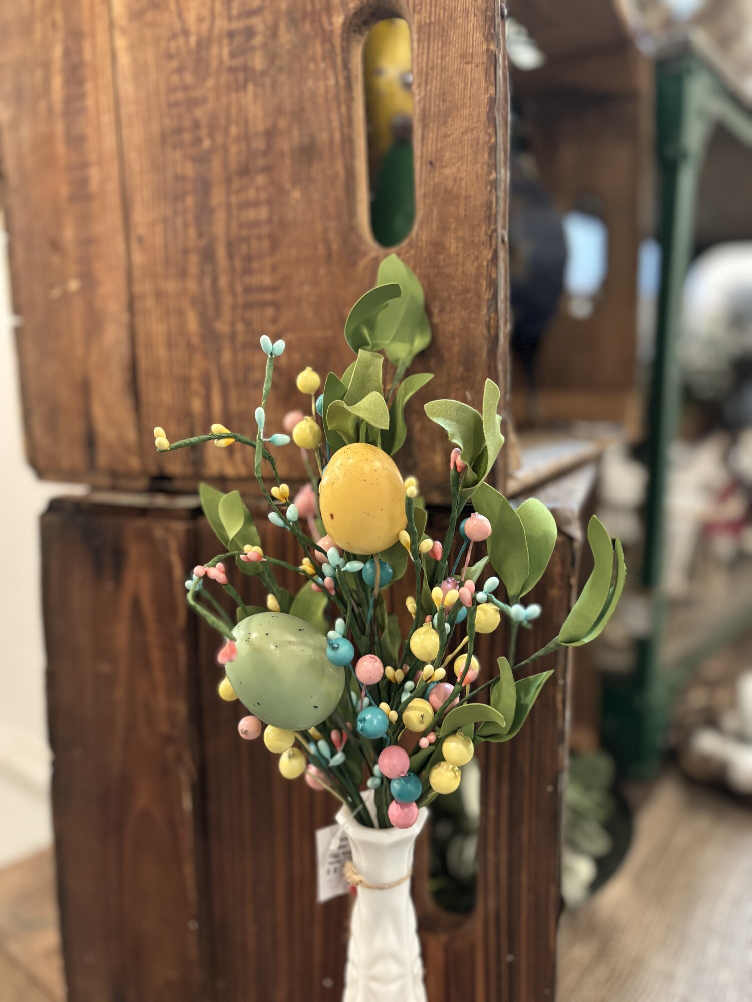Egg and herb stem features pastel colored eggs, seeds and berries for a bright themed easter finish.  Bush has fabric leaves and paper wrapped branch.
Stem measures 15 inches high